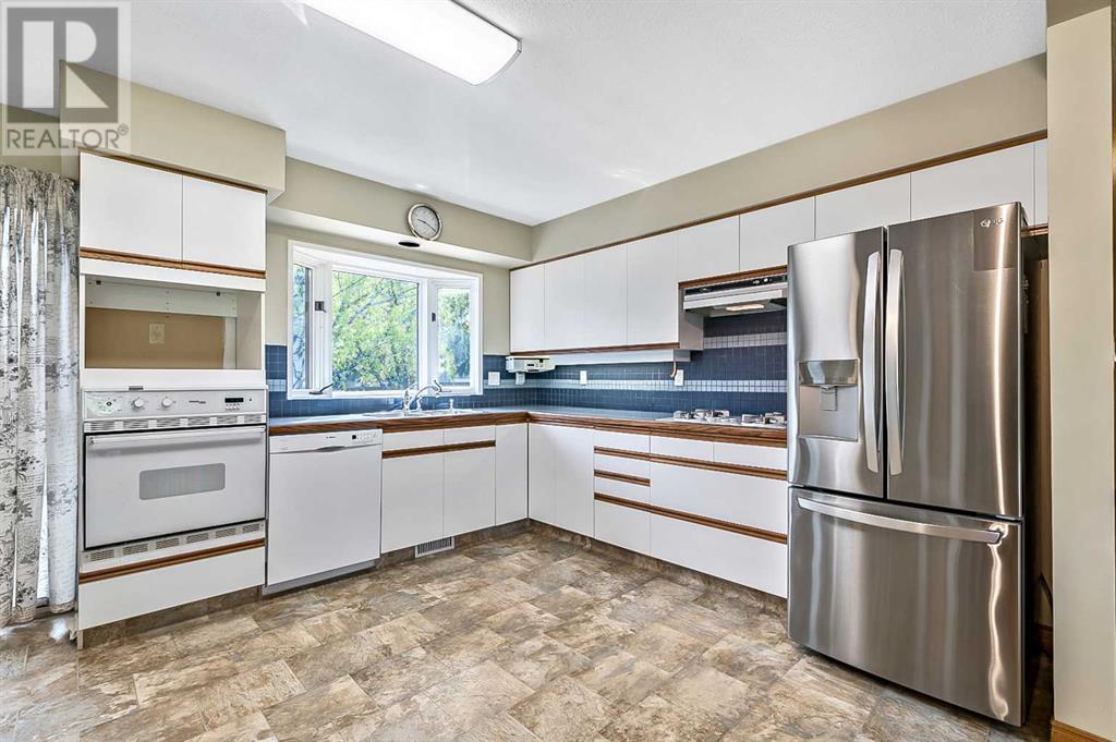 8 Heather Place Sw, Calgary, Alberta  T2V 3L4 - Photo 6 - A2221489