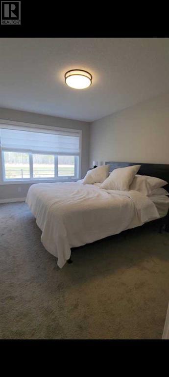 46 Cottageclub Lane, Rural Rocky View County, Alberta  T4C 1B1 - Photo 15 - A2205925