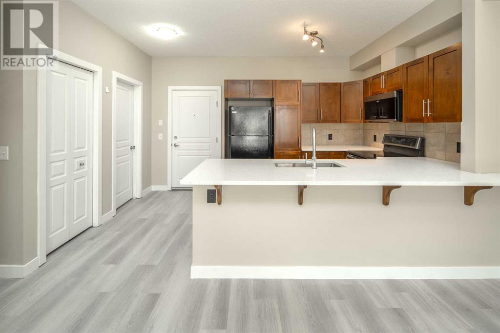 209, 48 Panatella Road Nw, Calgary, Alberta  T3K 0V4 - Photo 3 - A2204469