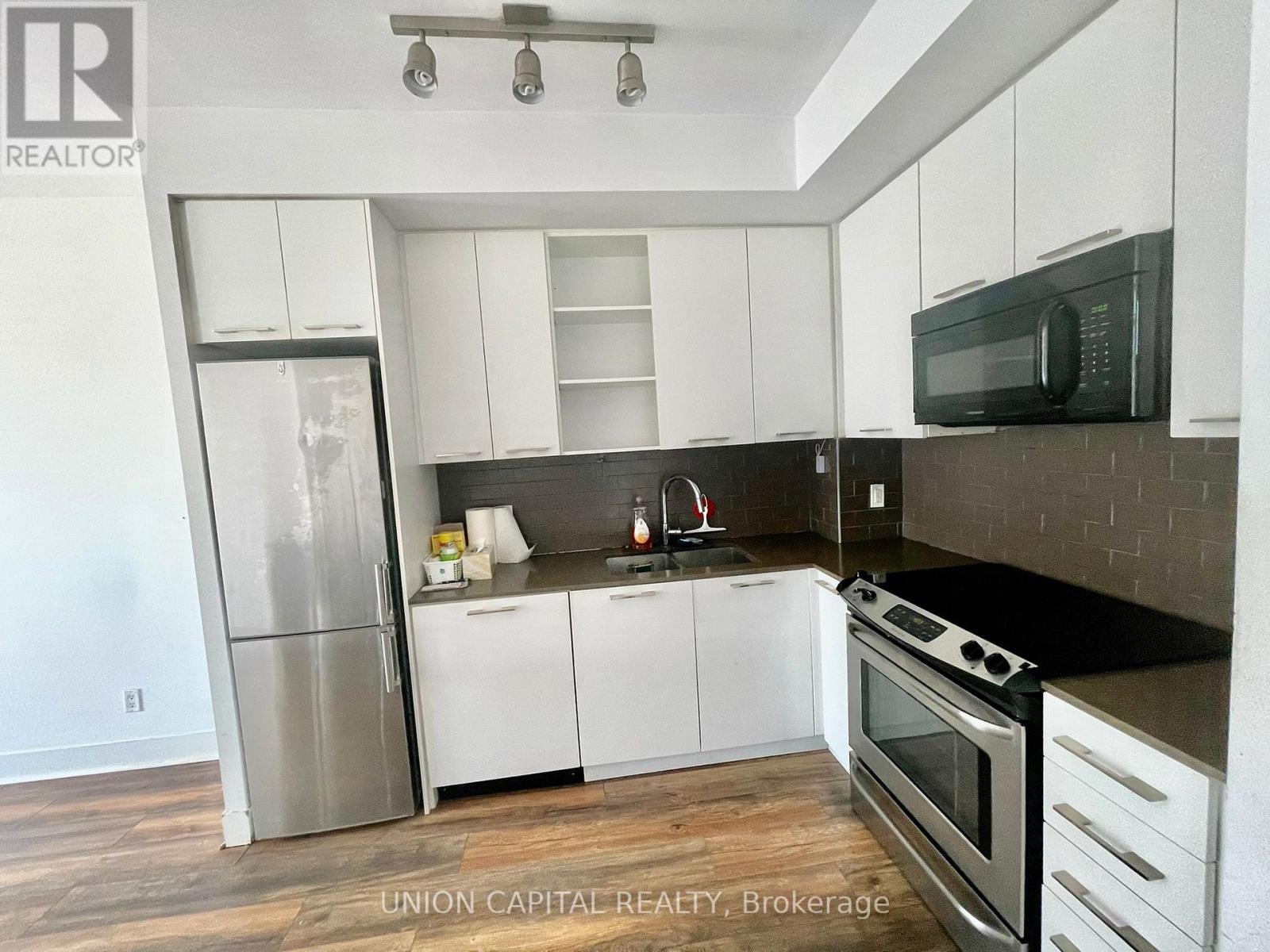 1201 - 9471 Yonge Street, Richmond Hill, Ontario  L4C 0Z5 - Photo 6 - N12152616