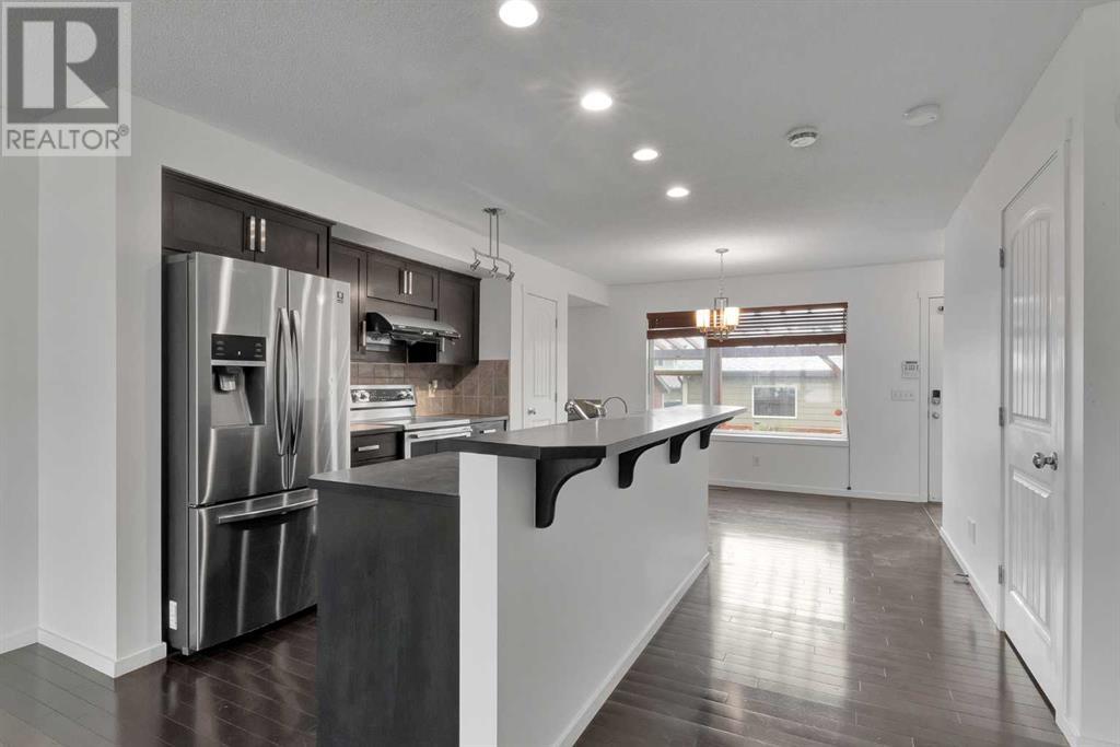 724 Panamount Boulevard Nw, Calgary, Alberta  T3K 0P7 - Photo 5 - A2221448