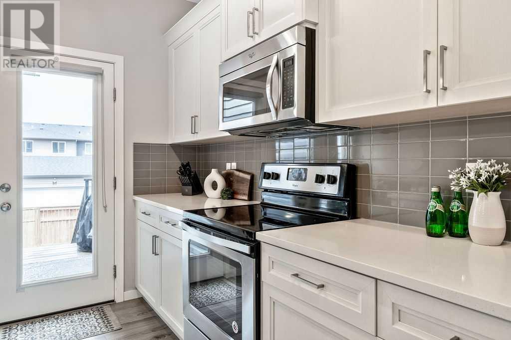 8 Emberside Place, Cochrane, Alberta  T4C 2L8 - Photo 5 - A2219268