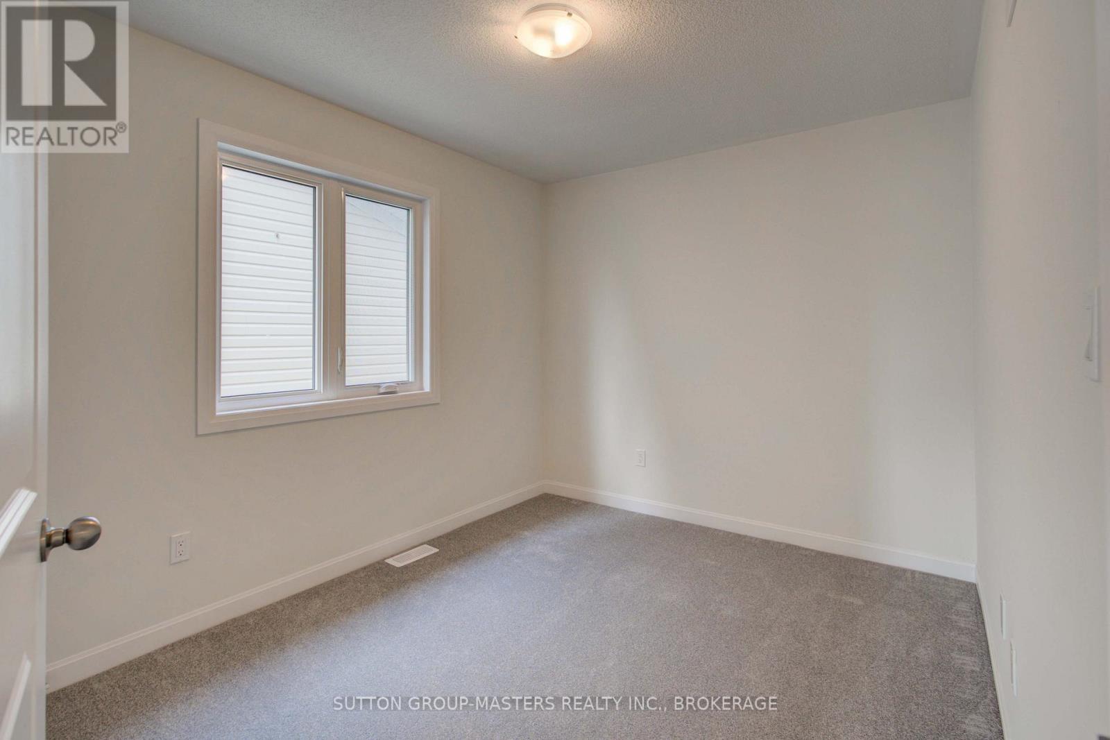 102 Oakmont Drive, Loyalist, Ontario  K0H 1G0 - Photo 36 - X12152964