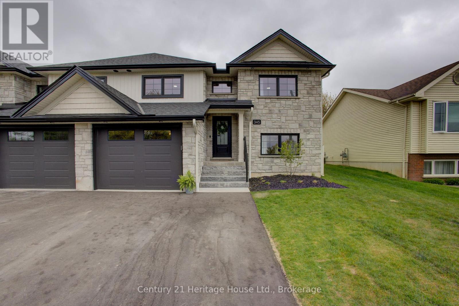 Property at 345 QUEEN STREET N image 1