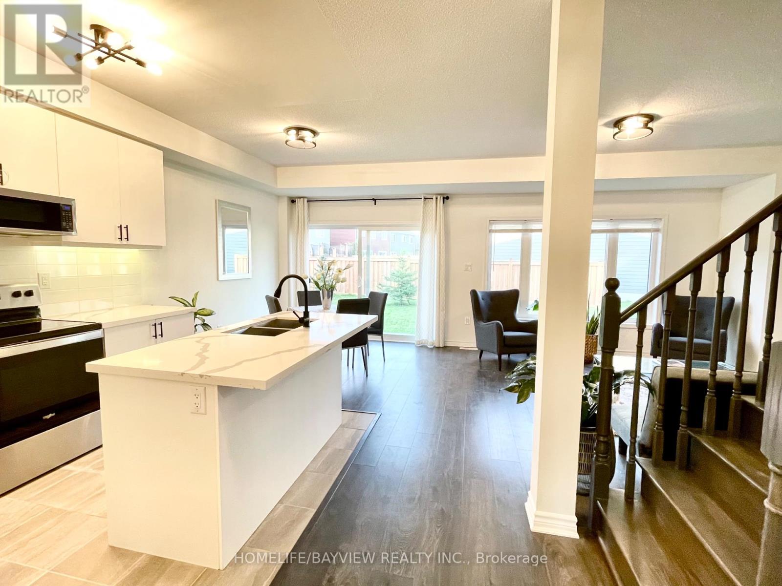 128 Village Gate Drive, Wasaga Beach, Ontario  L9Z 0J7 - Photo 6 - S12153450
