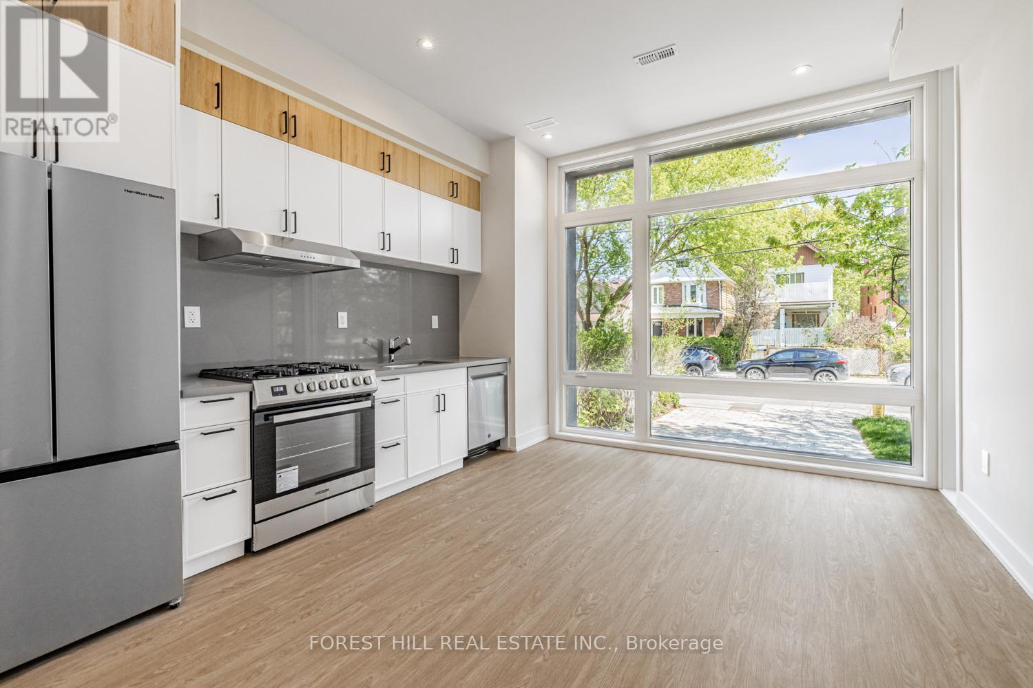 Main #1 - 124 Kenwood Avenue, Toronto, Ontario  M6C 2S3 - Photo 2 - C12153543