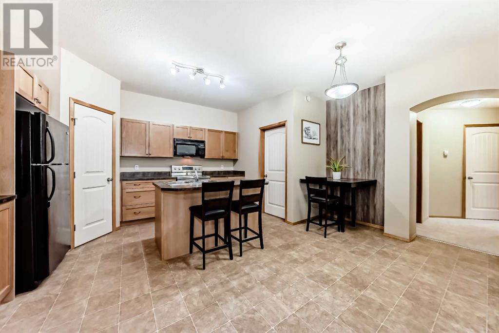 101, 161 Panatella Landing Nw, Calgary, Alberta  T3K 0K8 - Photo 7 - A2218896