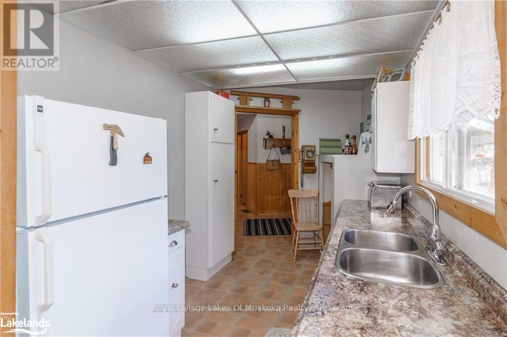 32 Maple Leaf Drive, Huntsville, Ontario  P1H 2J2 - Photo 6 - X12154256