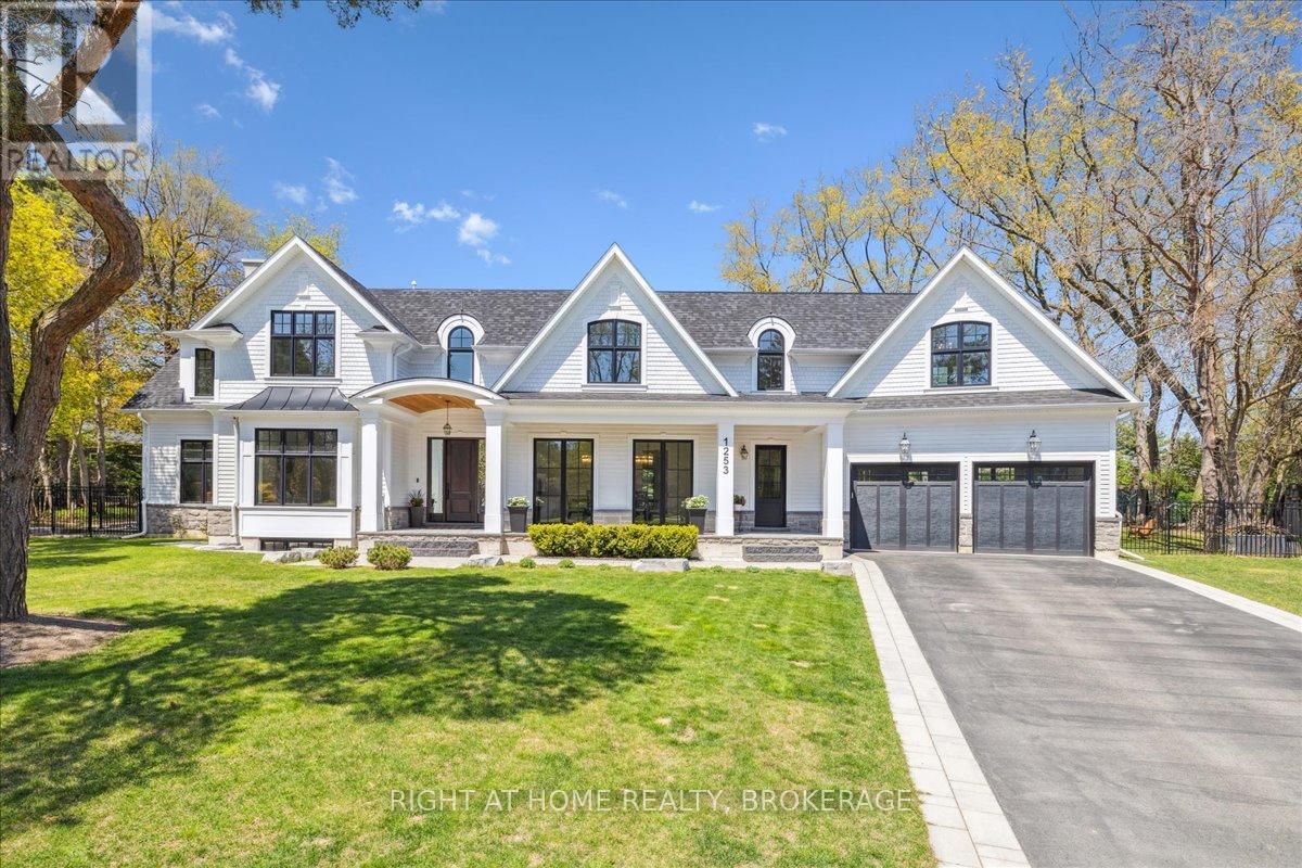 Welcome to 1253 Crawford Court, an exceptional custom-built luxury estate situated in the prestigious Morrison neighborhood of South Oakville. Located on a premium, mature tree-lined pie-shaped lot within a private cul-de-sac, this property represents a rare opportunity. This distinguished residence offers over 7,700 square feet of meticulously designed, flawlessly finished family living space.  Constructed with timeless elegance and equipped with state-of-the-art smart home technology, this architectural masterpiece features soaring 10-foot ceilings, wide-plank engineered hardwood flooring, and a striking two-story family room that floods the home with natural light. The open-concept gourmet kitchen is tailored for culinary enthusiasts, showcasing custom full-height face-frame cabinetry, a spacious quartz island, and high-end Wolf and SubZero appliances.  Intended for sophisticated entertaining, the residence includes expansive formal living and dining rooms, a fully equipped home theater, and seamless indoor-outdoor transitions to a landscaped backyard oasis.  Upstairs, the luxurious primary suite offers a tranquil retreat, complete with a spa-like ensuite featuring heated floors, a soaking tub, and an oversized custom walk-in closet. Three additional bedrooms, each with private ensuite baths, a sunlit bonus room, and a spacious, fully equipped laundry area provide both comfort and practicality for the entire family. The lower level is equally impressive, encompassing a home gym, an oversized shower room, a wet bar with a wine fridge, and an stylish  lounge with a double-sided Napoleon fireplace.  Additionally, a private guest or nanny suite with a separate entrance affords privacy and flexibility for multigenerational living. Throughout the basement, radiant in-floor heating ensures year-round comfort.1253 Crawford Court transcends the concept of a home; it epitomizes an elevated lifestyle. (id:48254)