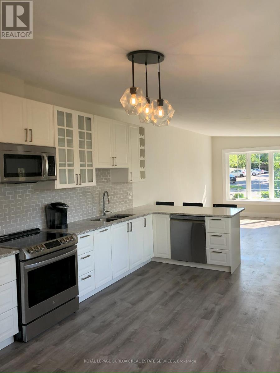 1135 Tavistock Drive, Burlington (Mountainside), Ontario  L7P 2N3 - Photo 1 - W12154400