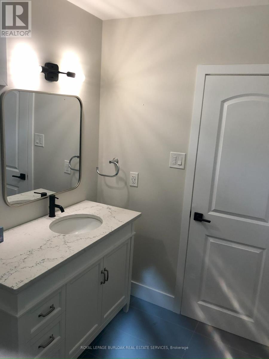1135 Tavistock Drive, Burlington, Ontario  L7P 2N3 - Photo 12 - W12154400