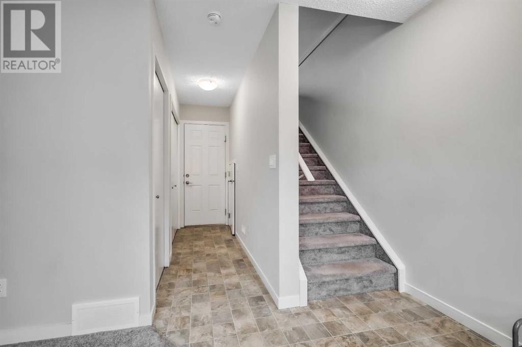 202 Evansridge Common Nw, Calgary, Alberta  T3P 0P3 - Photo 5 - A2221824