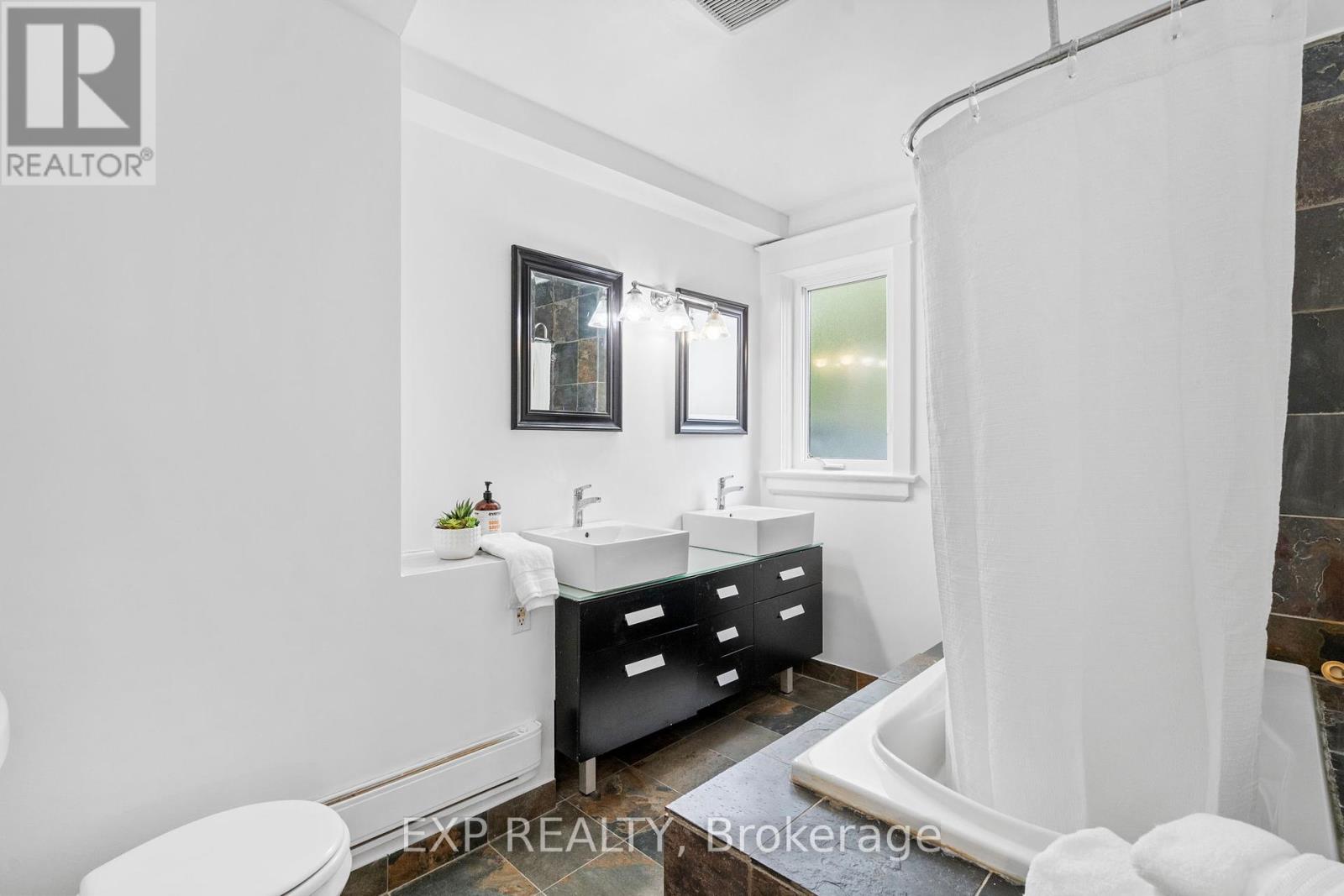 26 Glen Manor Drive, Toronto, Ontario  M4E 2X2 - Photo 33 - E12154784
