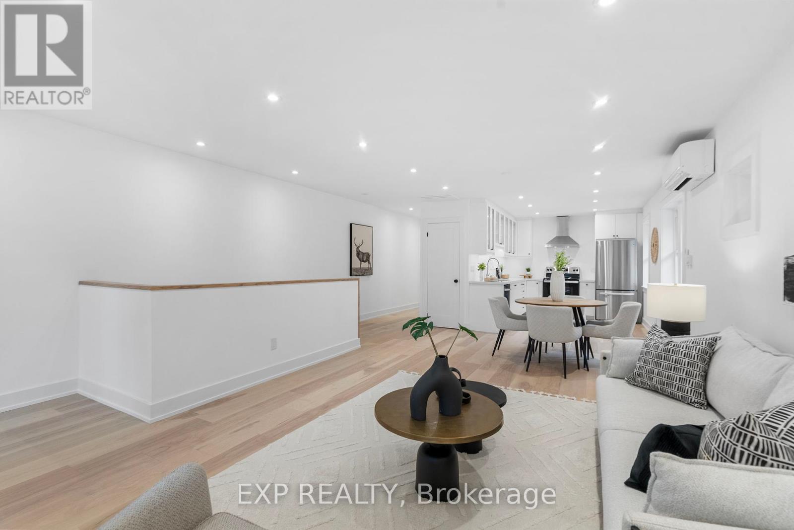26 Glen Manor Drive E, Toronto, Ontario  M4E 2X2 - Photo 7 - E12154784