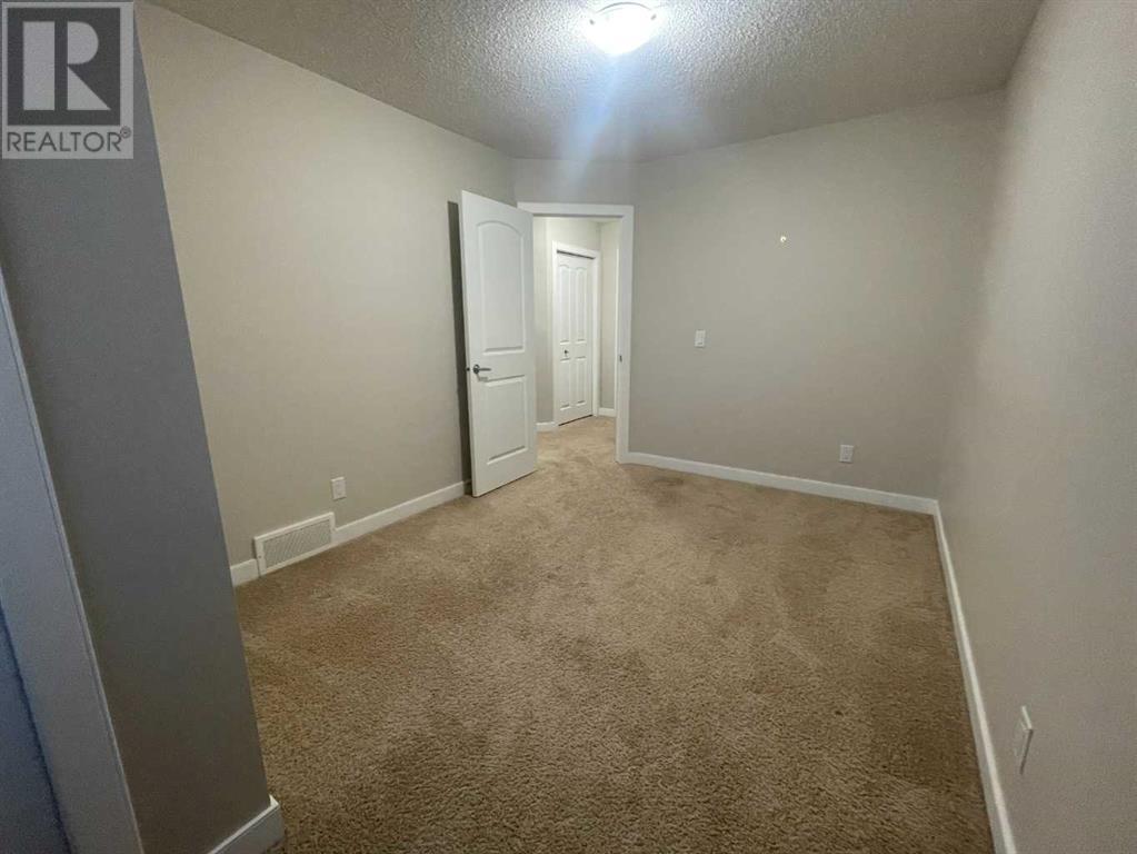13 Belgian Street, Cochrane, Alberta  T4C 0M2 - Photo 11 - A2202408