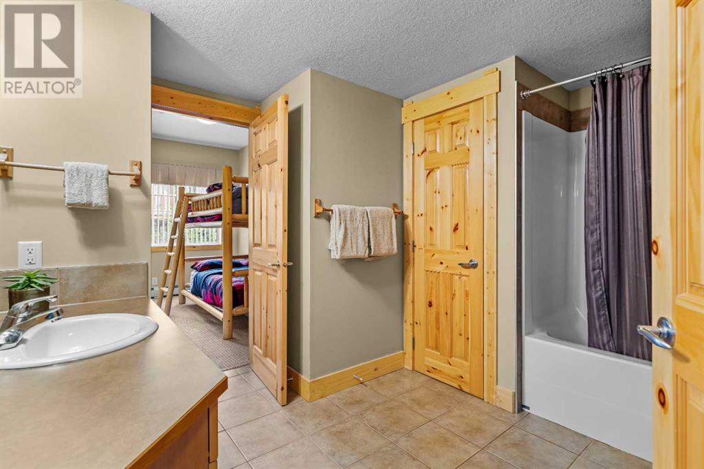 215, 175 Crossbow Place, Canmore, Alberta  T1W 3H7 - Photo 19 - A2221804