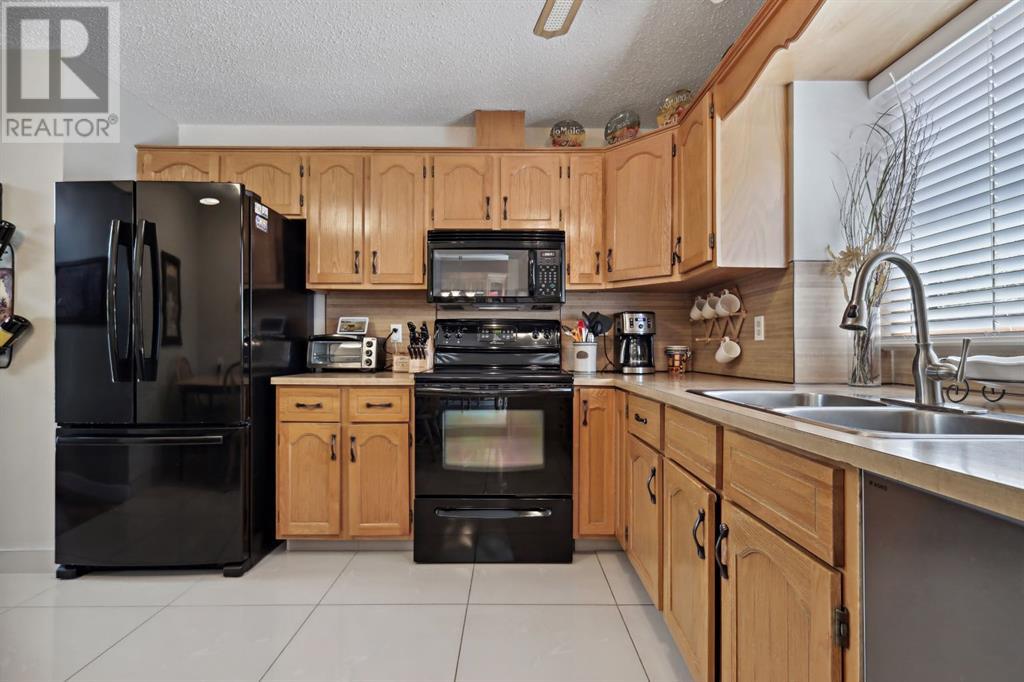 2407 98 Avenue Sw, Calgary, Alberta  T2V 4S7 - Photo 7 - A2220758