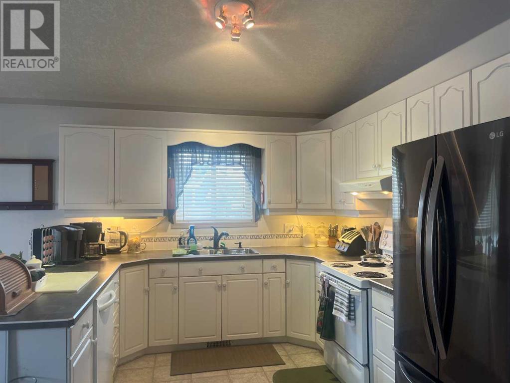 301 9 Street, Beiseker, Alberta  T0M 0G0 - Photo 8 - A2222051