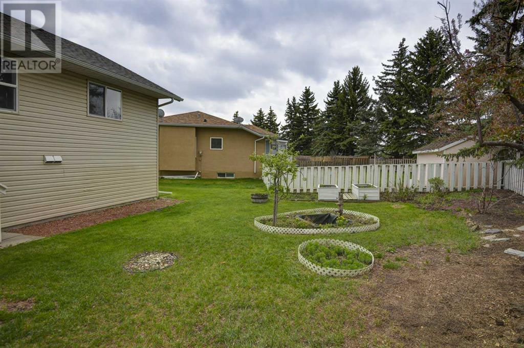 15 Village Green, Carstairs, Alberta  T0M 0N0 - Photo 36 - A2222039