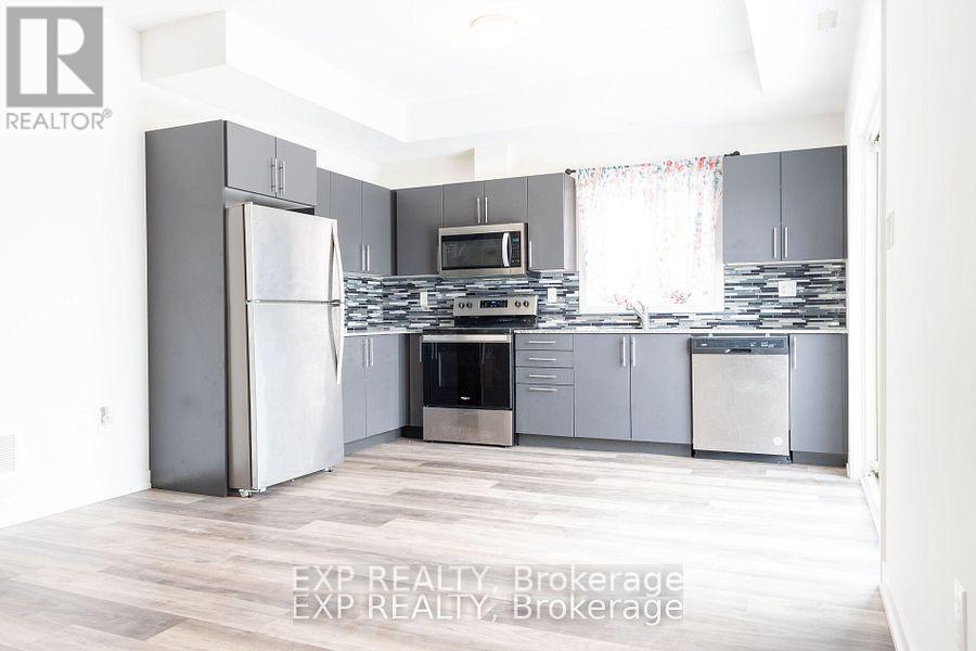 40 - 205 West Oak Trail, Kitchener, Ontario  N2R 1R4 - Photo 4 - X12156032