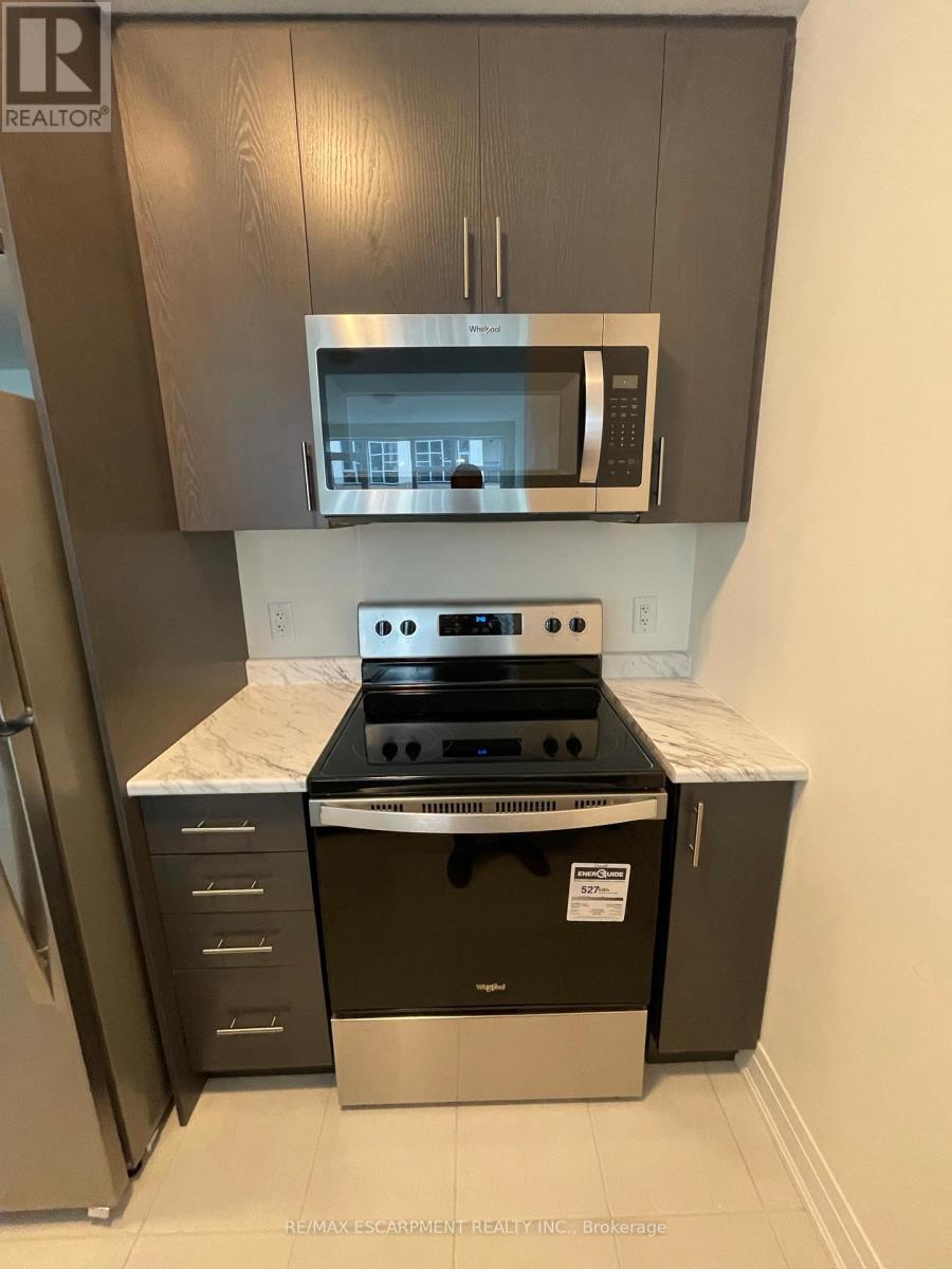 334 - 16 Concord Place, Grimsby, Ontario  L3M 0G6 - Photo 2 - X12156242