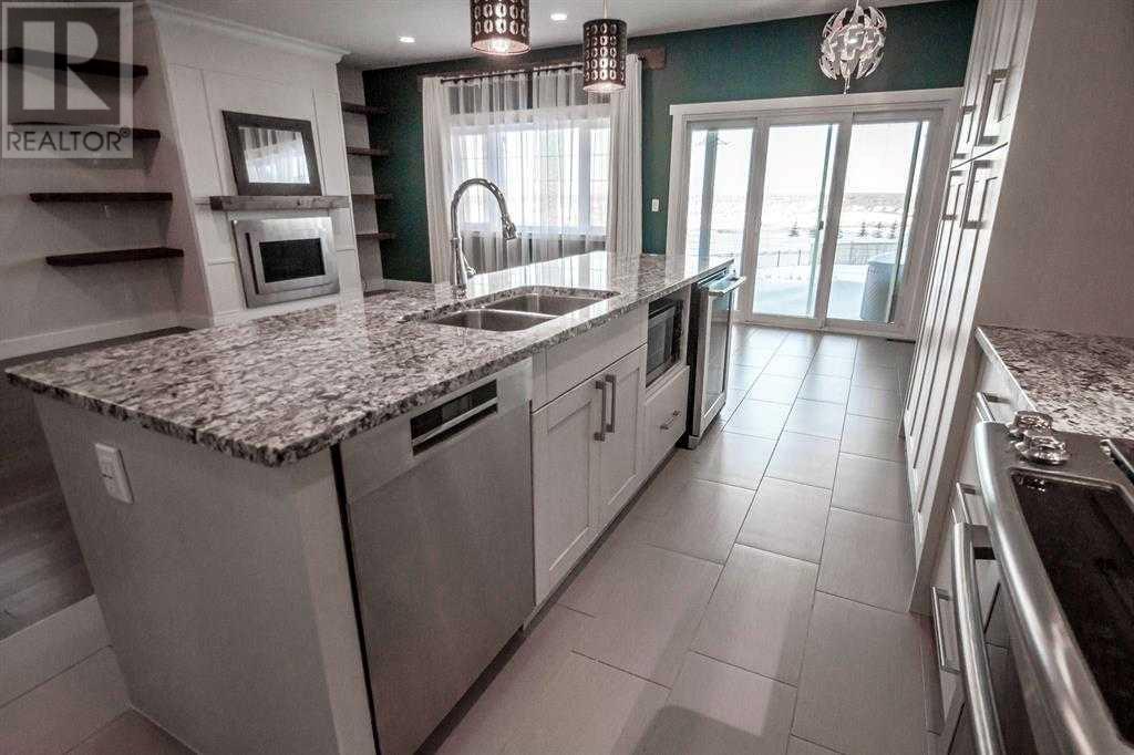 209 Collicott Drive, Fort Mcmurray, Alberta  T9K 2W9 - Photo 6 - A2221000