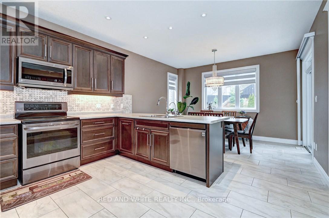 220 Ladyslipper Drive, Waterloo, Ontario  N2V 0E2 - Photo 4 - X12156274
