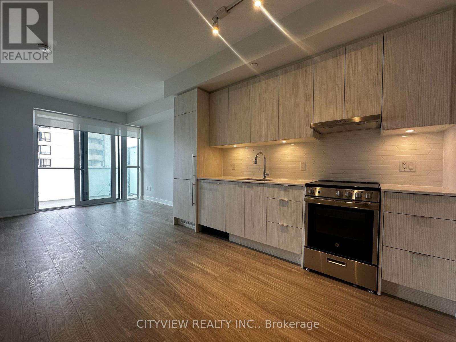 1409 - 430 Square One Drive, Mississauga, Ontario  L5B 0L6 - Photo 4 - W12156391
