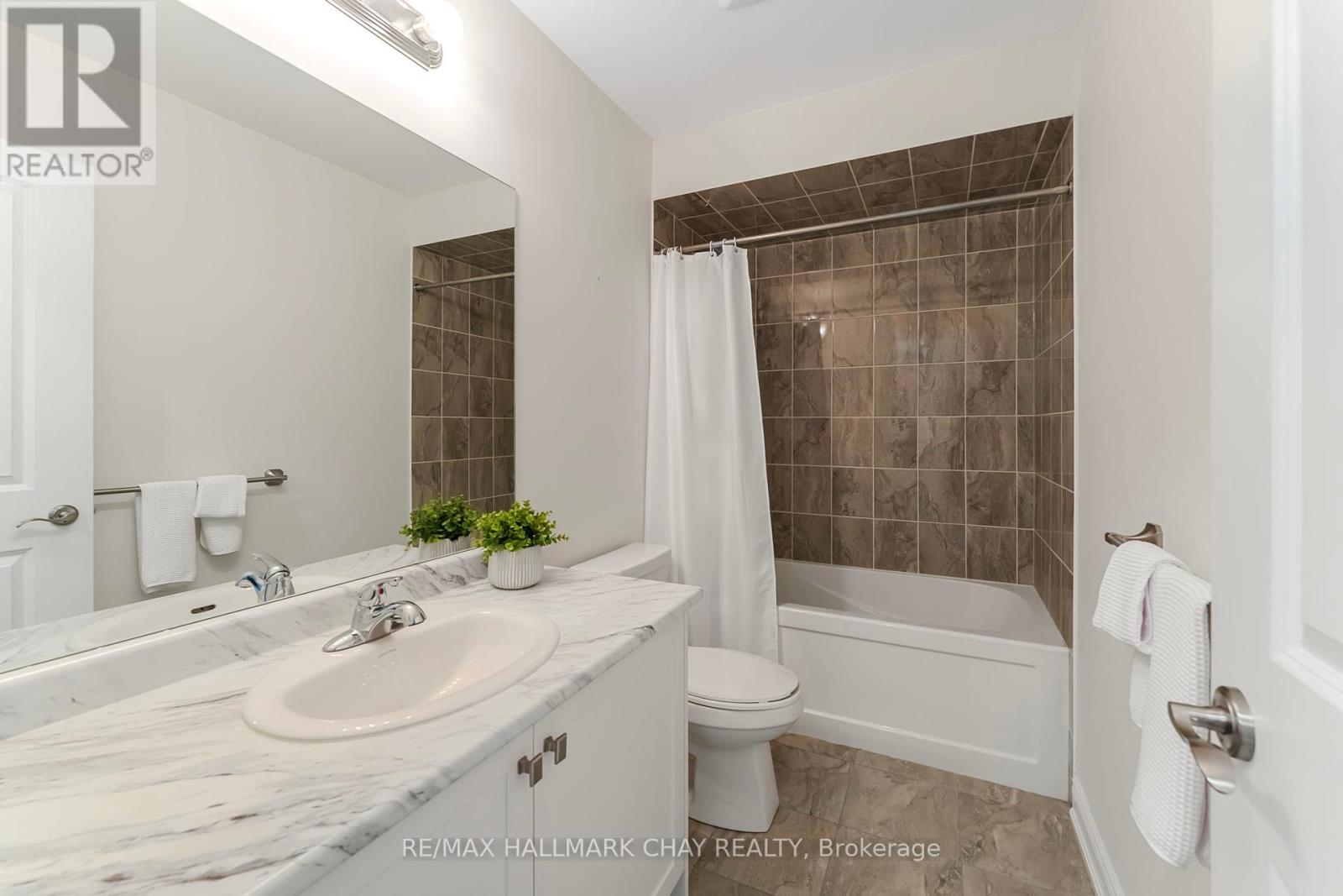 31 Arnold Crescent, New Tecumseth, Ontario  L9R 0T6 - Photo 36 - N12134188