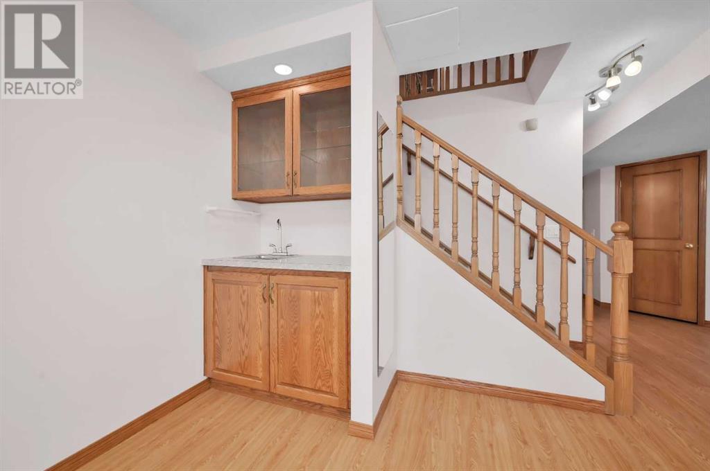 36 Bow Landing Nw, Calgary, Alberta  T3B 5J8 - Photo 31 - A2199690