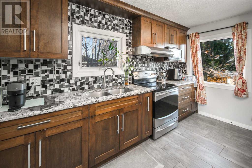 5424 Thorncliffe Drive Nw, Calgary, Alberta  T2K 2Z5 - Photo 5 - A2222438