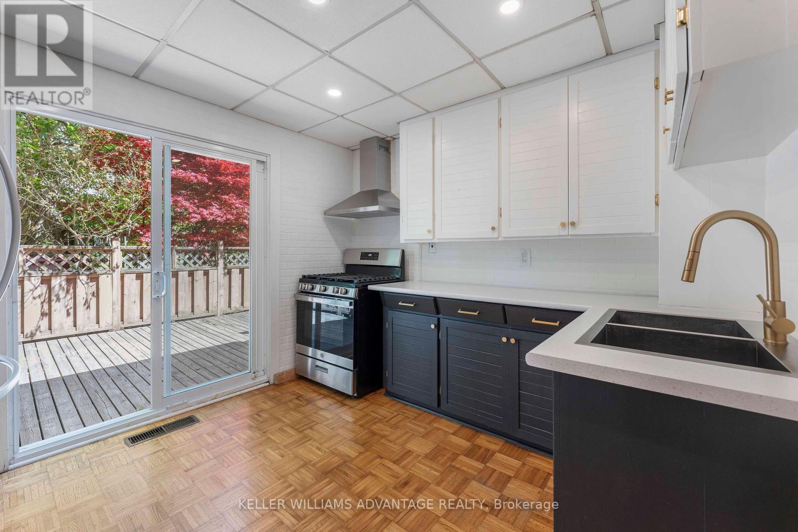 31 Hiltz Avenue, Toronto, Ontario  M4L 2N6 - Photo 6 - E12148162