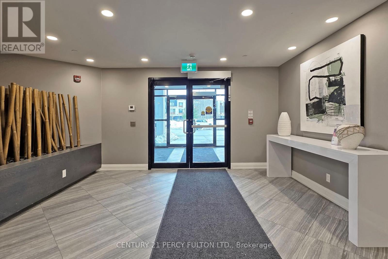 320 - 128 Grovewood Common, Oakville, Ontario  L6H 0X3 - Photo 11 - W12157474