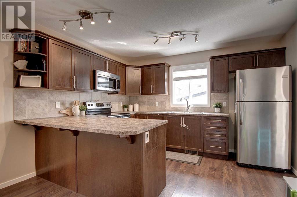 1009 Kingston Crescent Se, Airdrie, Alberta  T4A 0L3 - Photo 17 - A2216417