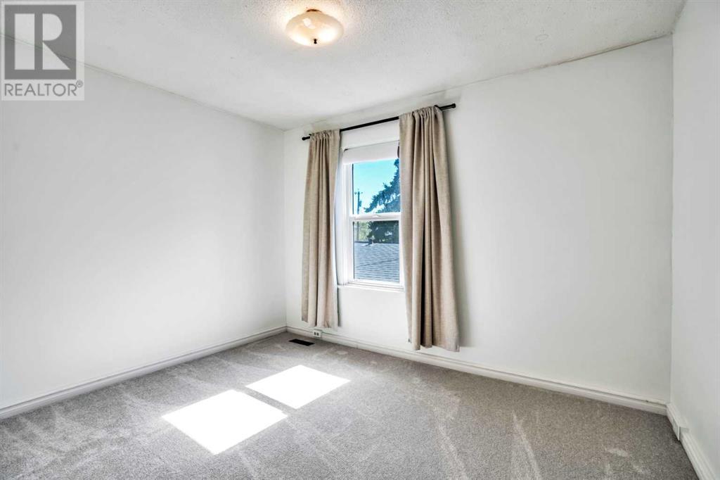1418 11 Avenue Se, Calgary, Alberta  T2G 0Z8 - Photo 32 - A2217470