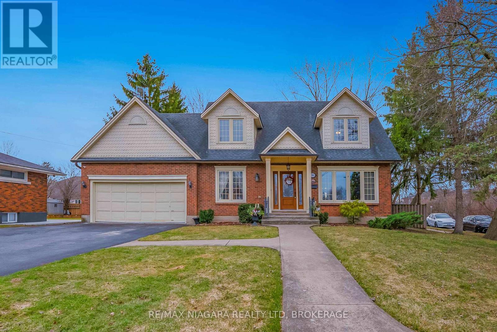 Welcome to this stunning, character-filled home located just steps from the scenic Chippawa Parkway and the Niagara River. This spacious residence is brimming with charm and offers the perfect blend of classic features and modern convenience. As you enter the main floor, you are greeted by beautiful hardwood floors throughout, leading you to a large living room with breathtaking views of the river. The formal dining room is elegant with French doors, perfect for family gatherings or entertaining guests. The open-concept eat-in kitchen overlooks a cozy sunken family room, complete with vaulted ceilings and a charming brick gas fireplace, creating a welcoming atmosphere. The main floor also features a 5th bedroom, currently being used as an office, and a convenient 2-piece bathroom. Upstairs, you'll find three generously sized bedrooms, a 4-piece bath, and a master suite that is truly a retreat. The master suite boasts a private parlour with a day bed, offering picturesque views of the Parkway and Niagara River. It also includes a large walk-in closet and a luxurious 4-piece bath, complete with a laundry chute for added convenience. The fully finished basement is a true bonus, with a separate entrance that provides excellent potential for an in-law suite. You'll find a cozy rec room, a billiards room with a bar, and two additional large storage rooms, along with a cold cellar. Outside, the property sits on a beautifully landscaped corner lot, featuring mature trees and a park-like backyard that provides a peaceful sanctuary. Entertain guests on the large deck or unwind in the hot tub, all while enjoying the serene surroundings. This remarkable home is located on one of Chippawas most sought-after streets, with a park just down the street and spectacular sunset views over the iconic Niagara Parkway. Close to schools, bus stops, shopping, restaurants and all other amenities, dont miss out on this true gem a unique opportunity to own a piece of paradise! (id:48254)