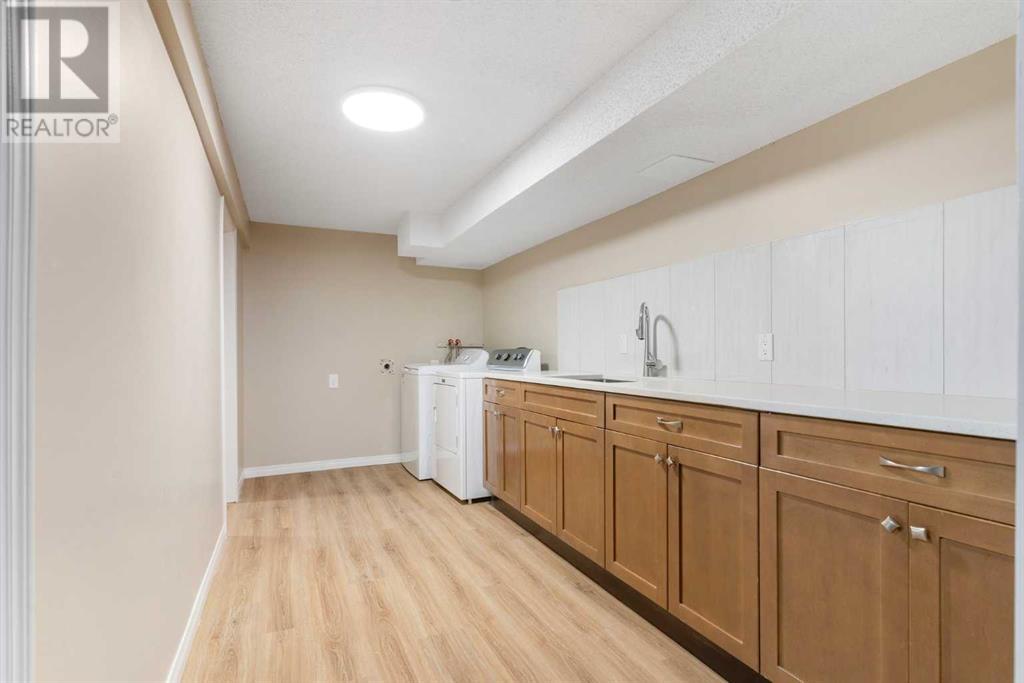 138 Sandstone Road Nw, Calgary, Alberta  T3K 2W8 - Photo 33 - A2209624