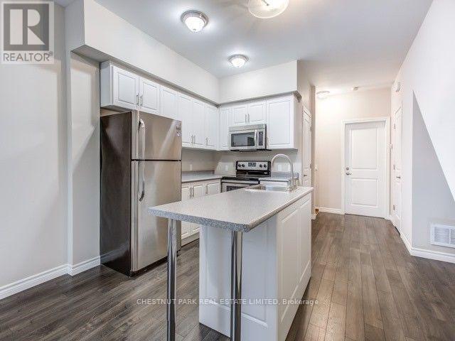 B - 30 Follis Avenue, Toronto, Ontario  M6G 1S3 - Photo 5 - C12158414