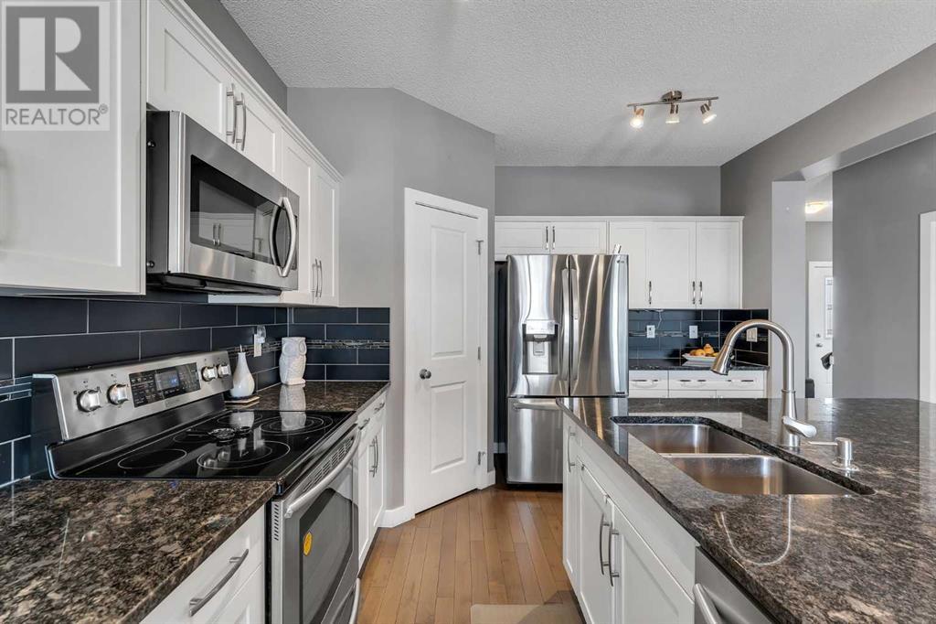 14 Kingsbridge Crescent Se, Airdrie, Alberta  T4A 0M8 - Photo 6 - A2214780
