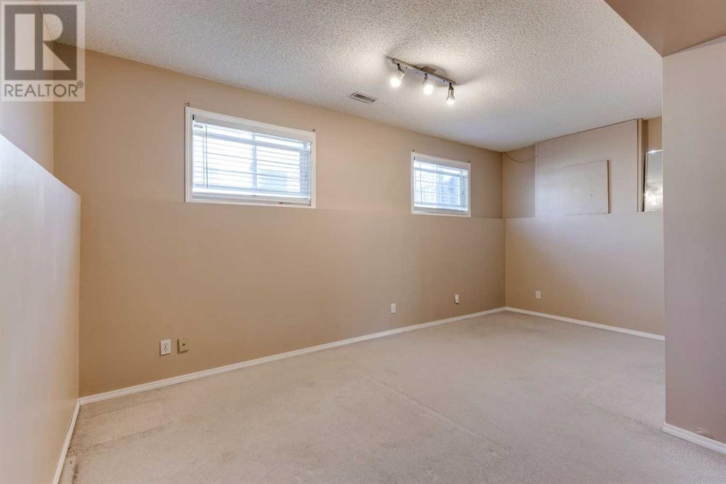 91 Martin Crossing Close Ne, Calgary, Alberta  T3J 3S2 - Photo 28 - A2209476
