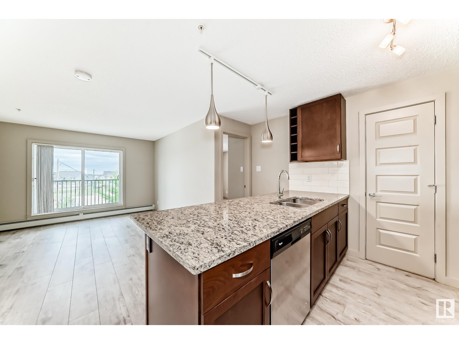 Property at #318 4008 SAVARYN DR SW image 3