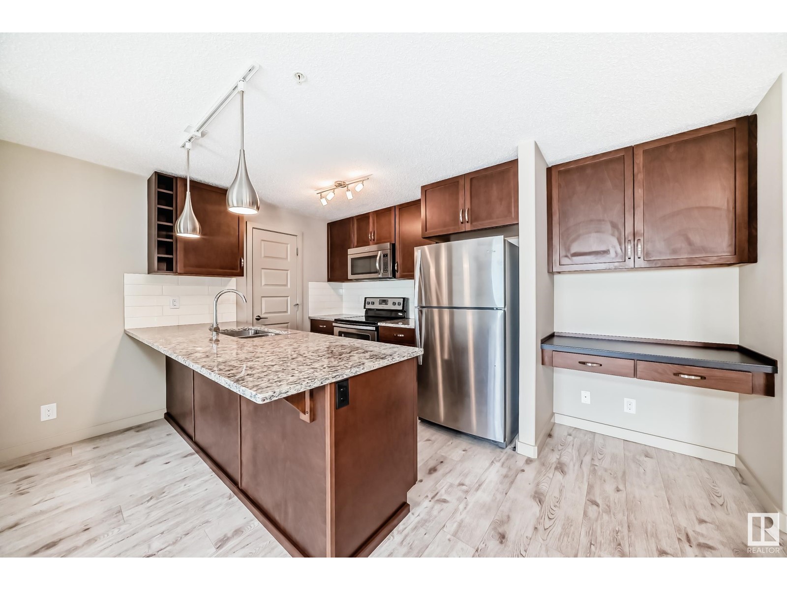 Property at #318 4008 SAVARYN DR SW image 2