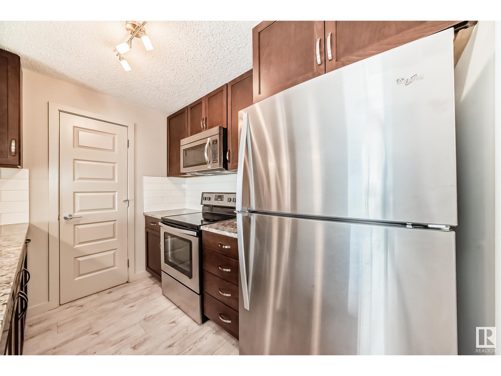 Property at #318 4008 SAVARYN DR SW image 4