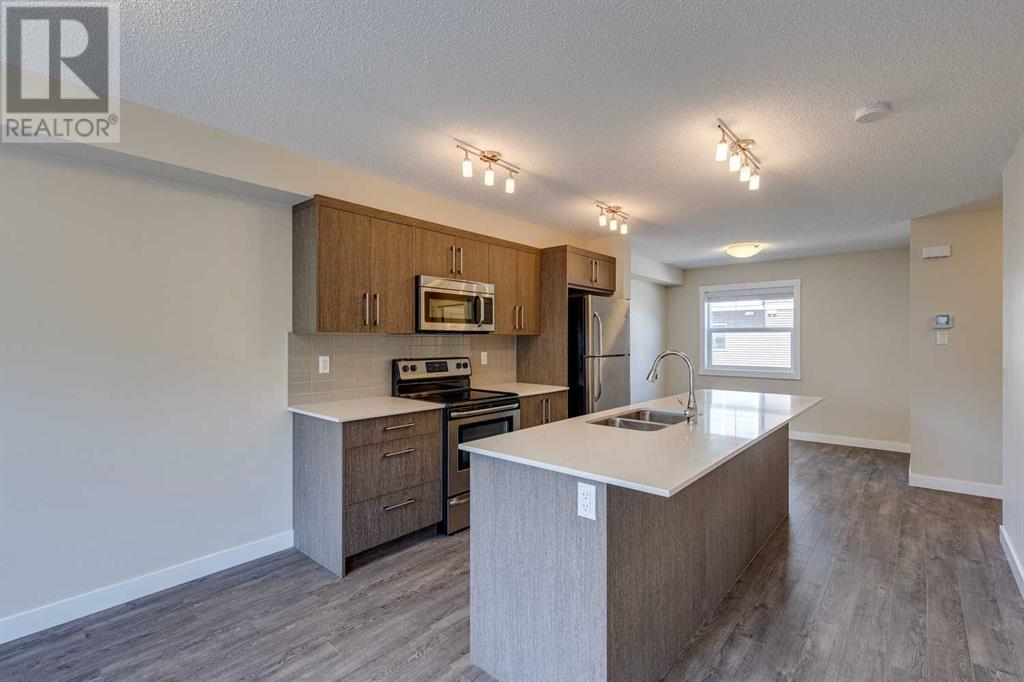 605, 1225 Kings Heights Way Se, Airdrie, Alberta  T4A 0T7 - Photo 5 - A2204103
