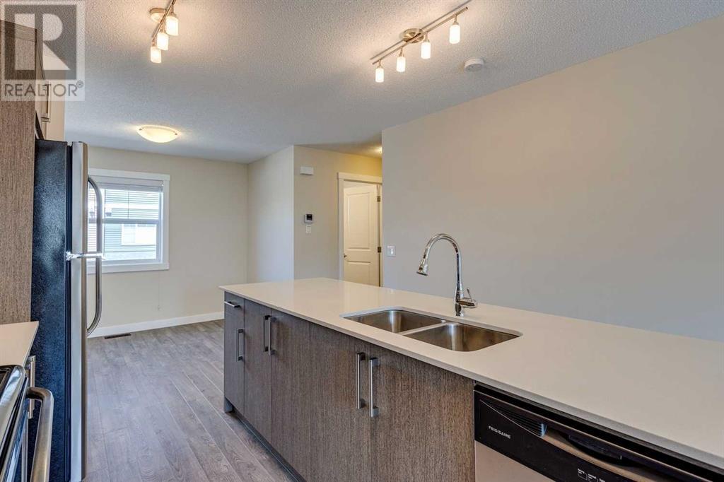 605, 1225 Kings Heights Way Se, Airdrie, Alberta  T4A 0T7 - Photo 7 - A2204103