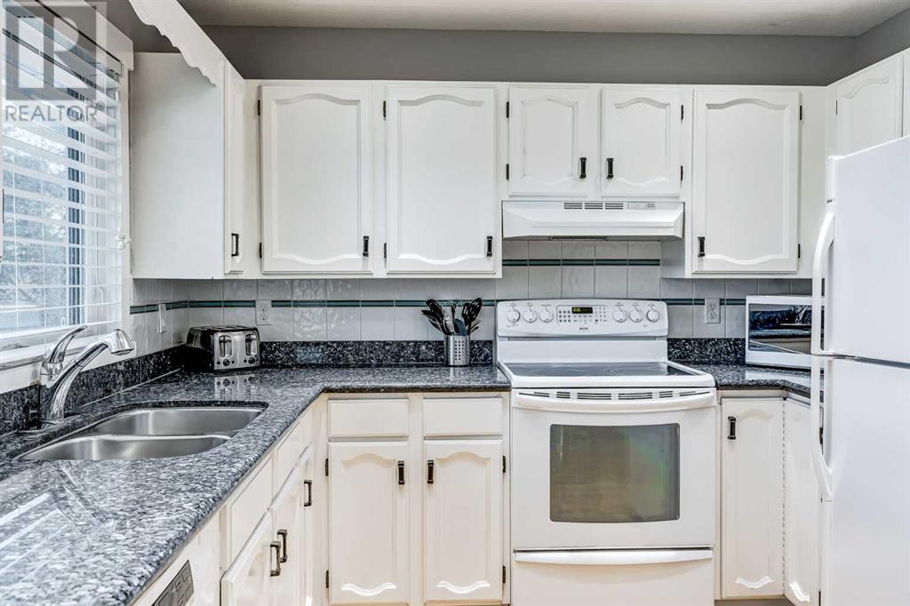 31 Woodmont Way Sw, Calgary, Alberta  T2W 4L7 - Photo 10 - A2220193