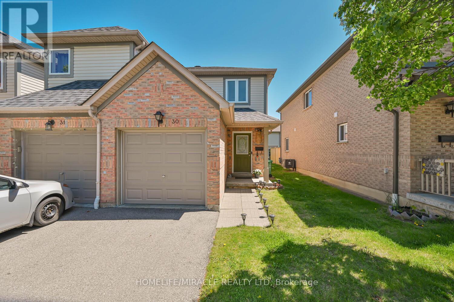 #30 - 5255 Guildwood Way N, Mississauga, Ontario  L5R 4A9 - Photo 1 - W12159501