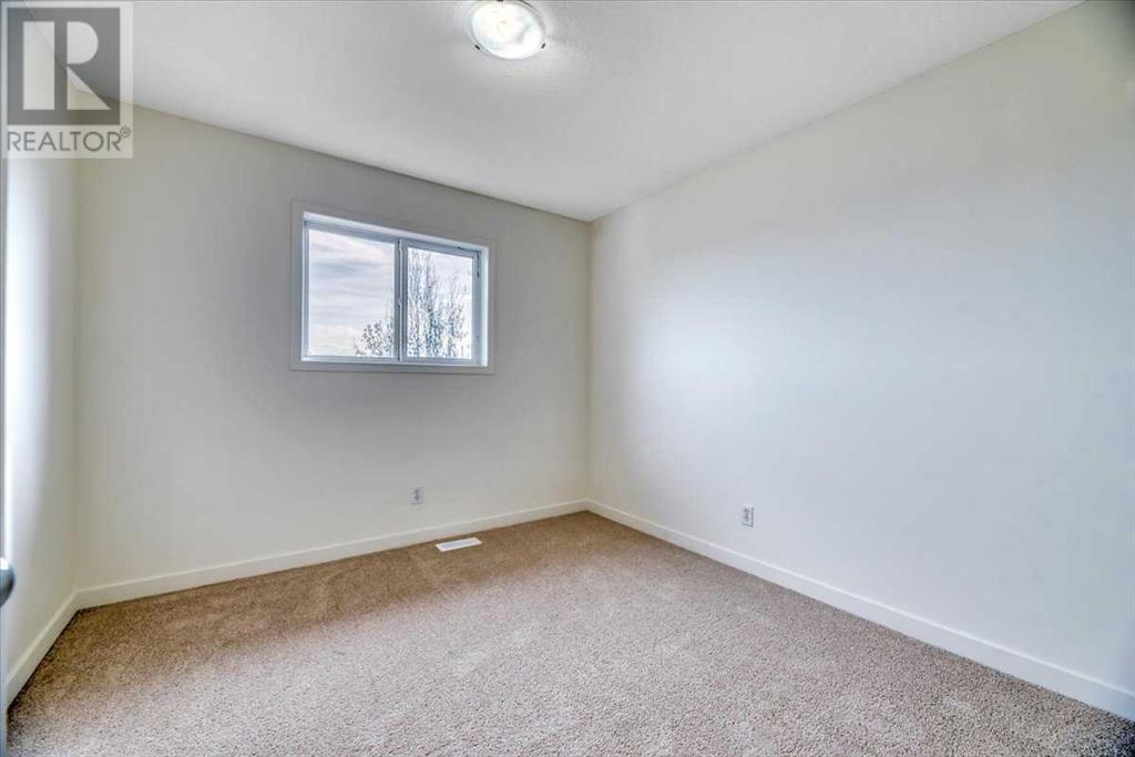 39 Everstone Rise Sw, Calgary, Alberta  T2Y 4J8 - Photo 30 - A2219560