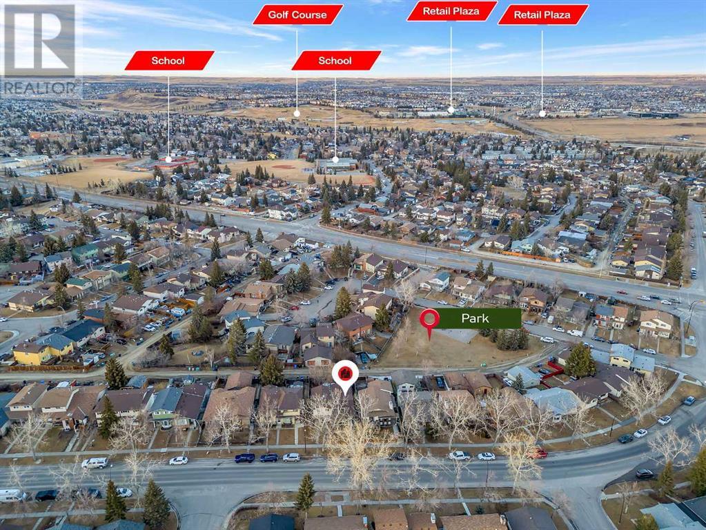 946 Berkley Drive Nw, Calgary, Alberta  T3K 1A2 - Photo 4 - A2222837