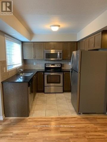 12 - 2484 Post Road, Oakville (Ro River Oaks), Ontario  L6H 0K1 - Photo 2 - W12160437